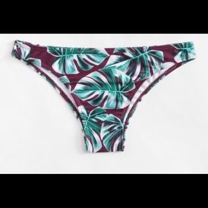 Leaf print swim bottoms